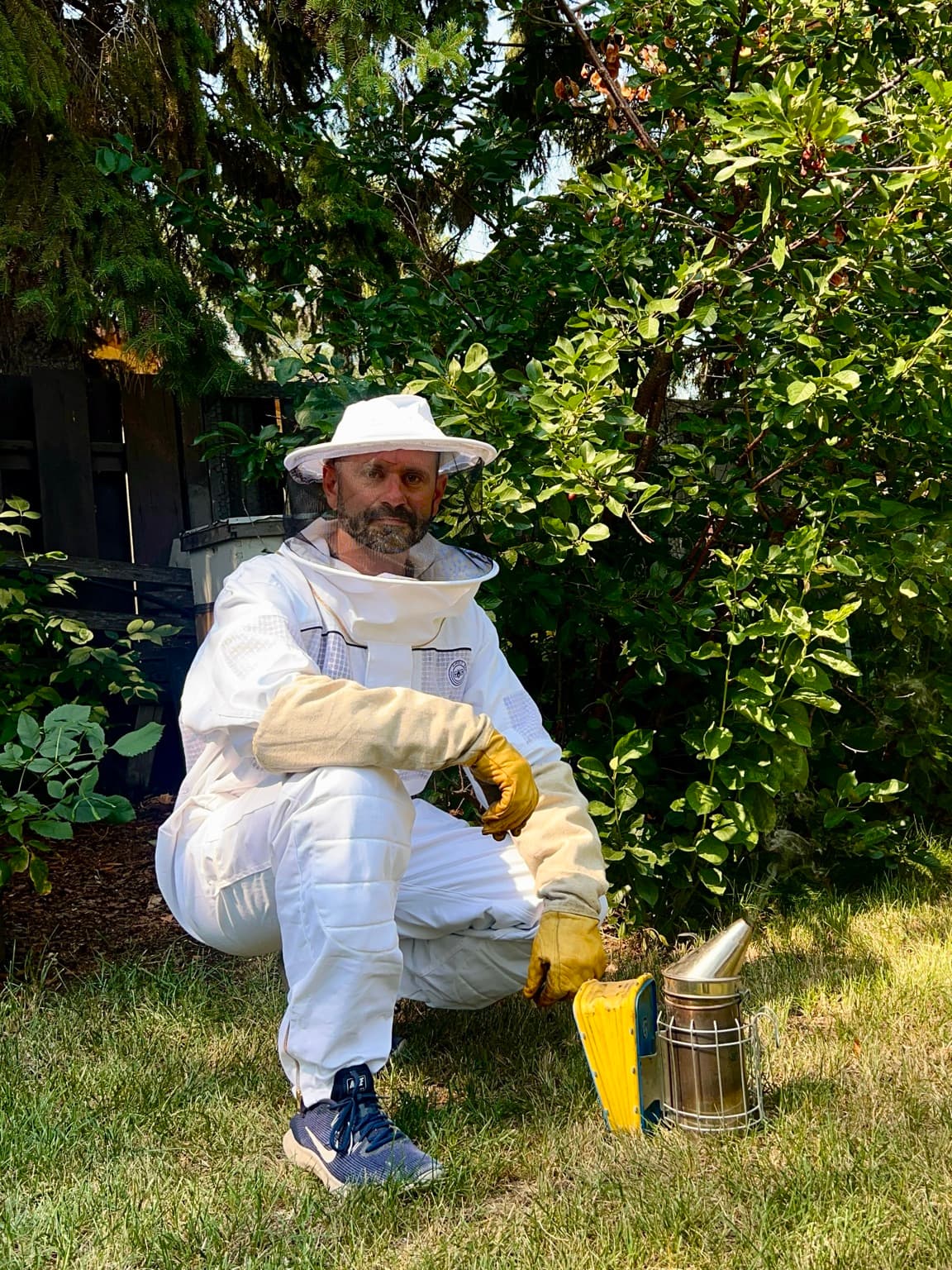Adam LeClaire in his beekeeping suit